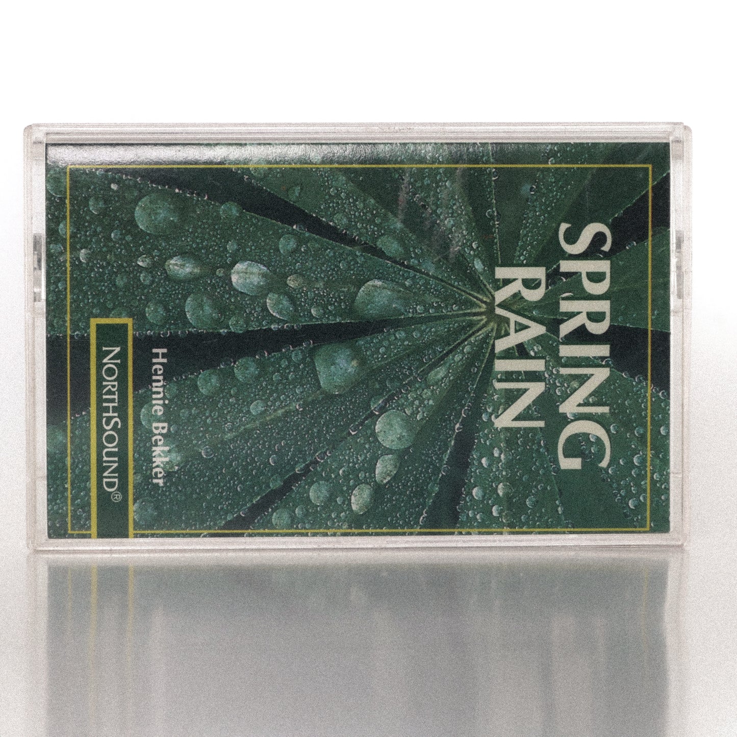 Spring Rain by Hennie Bekker cassette wallet displayed with its original plastic case