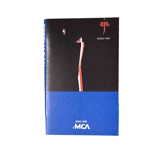 Original J-card for Aja by Steely Dan cassette wallet