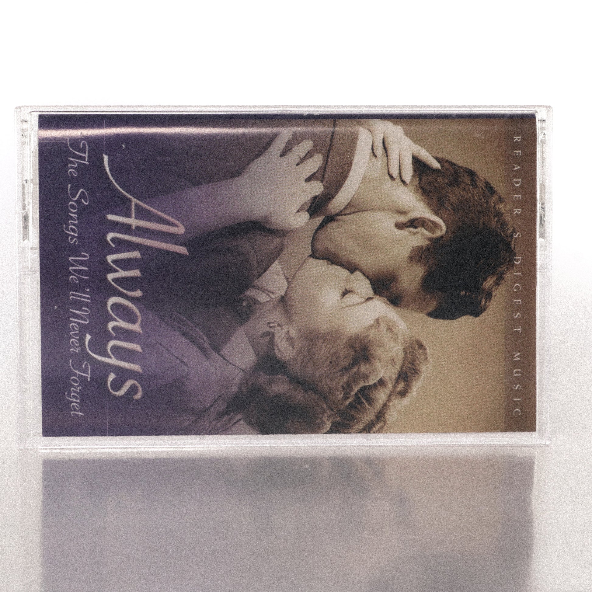 Always The Songs We’ll Never Forget cassette wallet displayed with its original plastic case