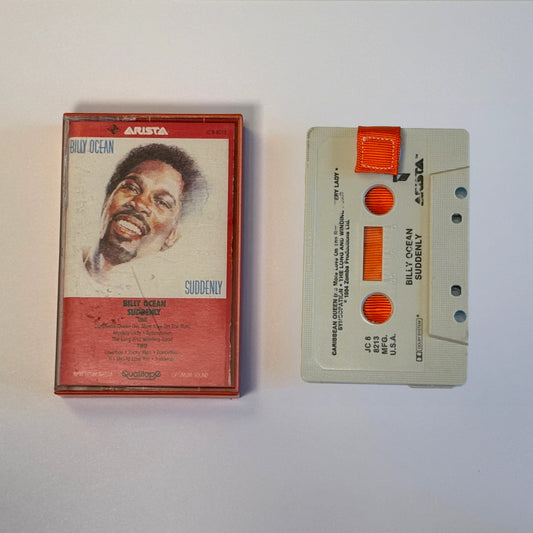 Billy Ocean Suddenly white cassette wallet with an orange pull tab beside its matching cassette case