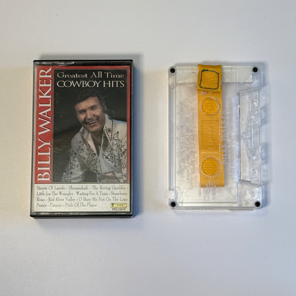 Billy Walker Greatest All Time Cowboy Hits clear cassette wallet with a yellow pull tab beside the original case