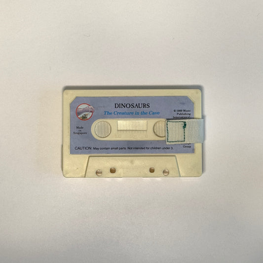 Front view of Dinosaurs – The Creature in the Cave Cassette Wallet