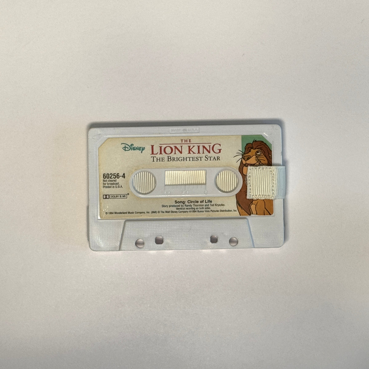 Front view of Disney's The Lion King – The Brightest Star Cassette Wallet – Cream Pull Tab