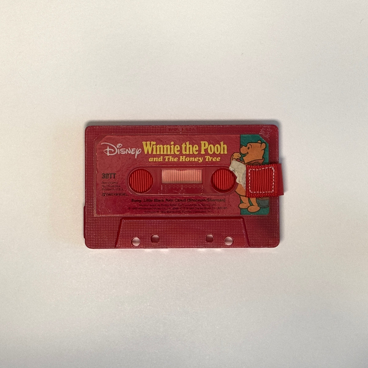 Front view of Disney's Winnie the Pooh and The Honey Tree Cassette Wallet