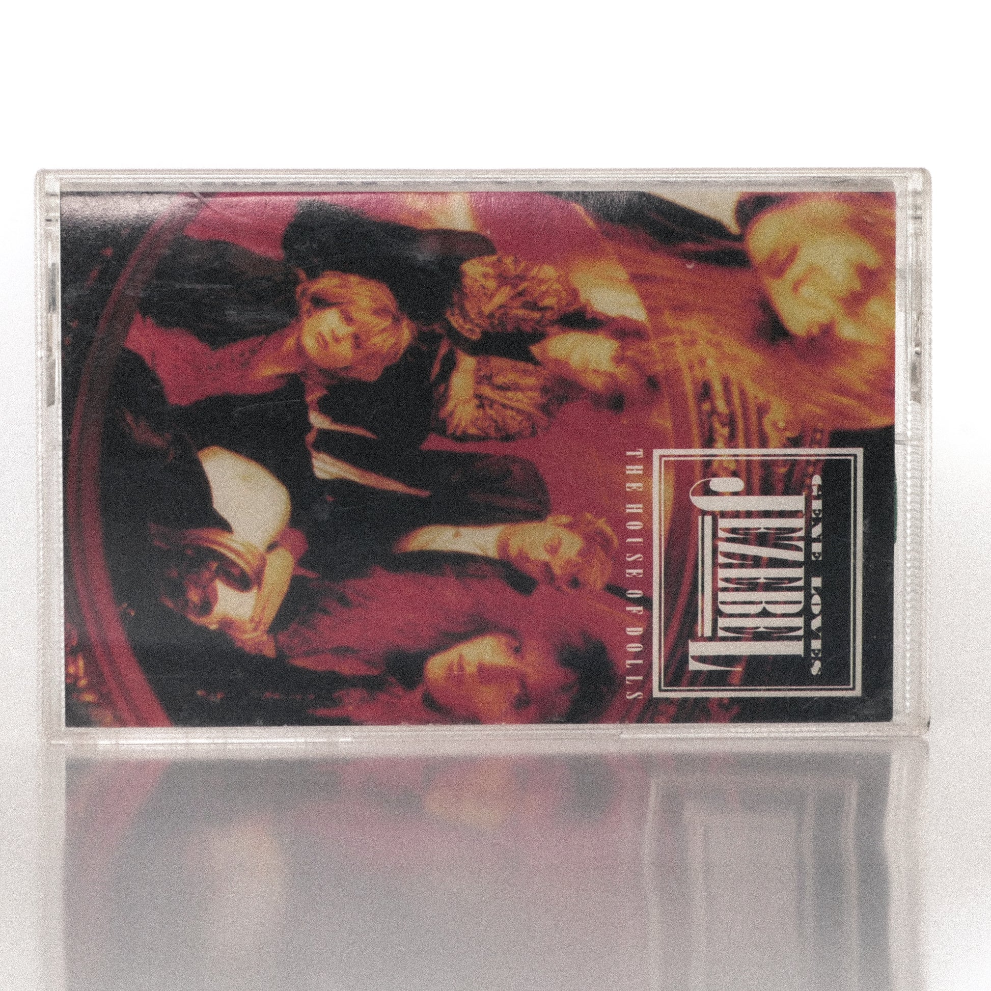 The House of Dolls by Gene Loves Jezebel cassette wallet displayed with its original plastic case