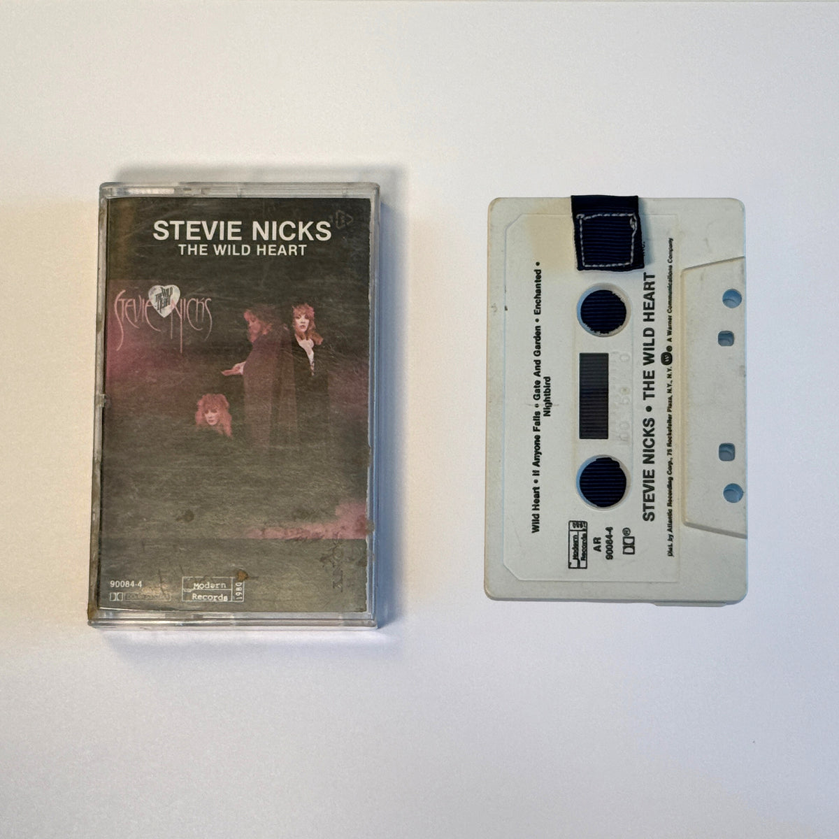 Stevie Nicks The Wild Heart white cassette wallet with a navy pull tab beside its matching cassette case