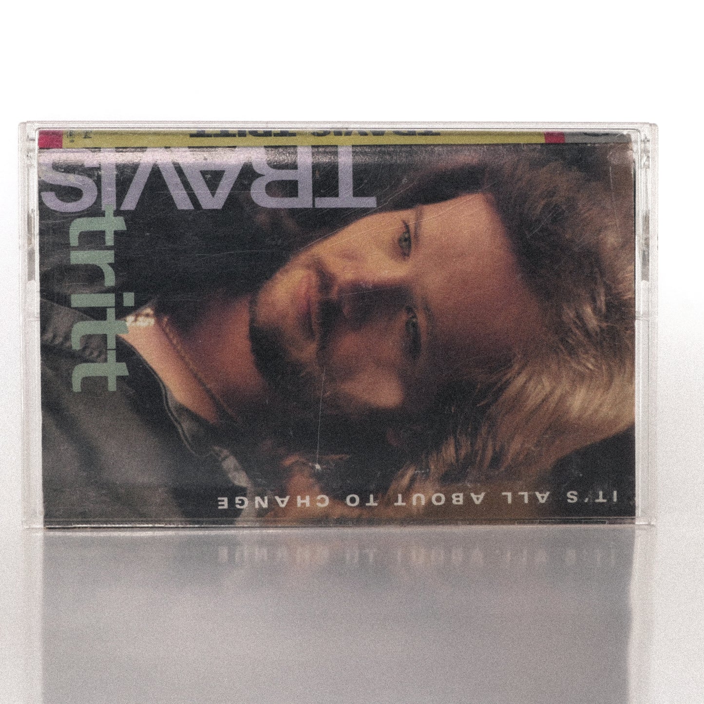 It’s All About to Change by Travis Tritt cassette wallet displayed with its original plastic case