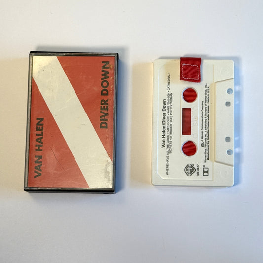 Van Halen Diver Down gray cassette wallet with a red pull tab beside the red and white original case